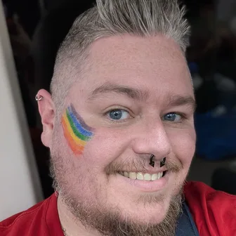 Photo of Dylan, your host